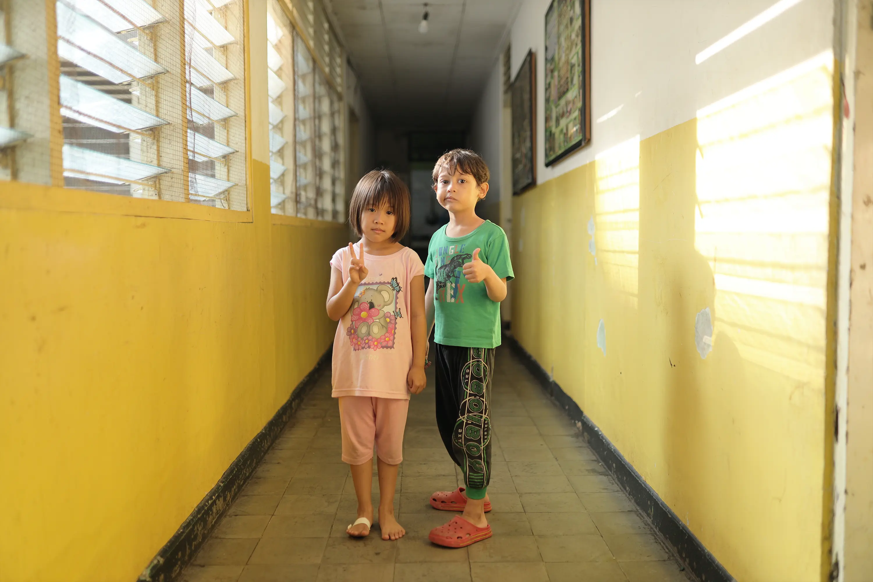 Indonesian children in classroom smiling